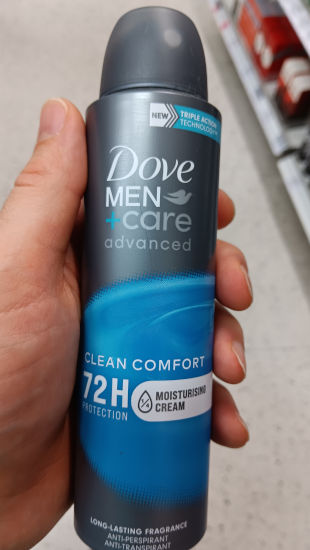 Andrew holding Dove Men+Care Advanced Clean Comfort Deodorant